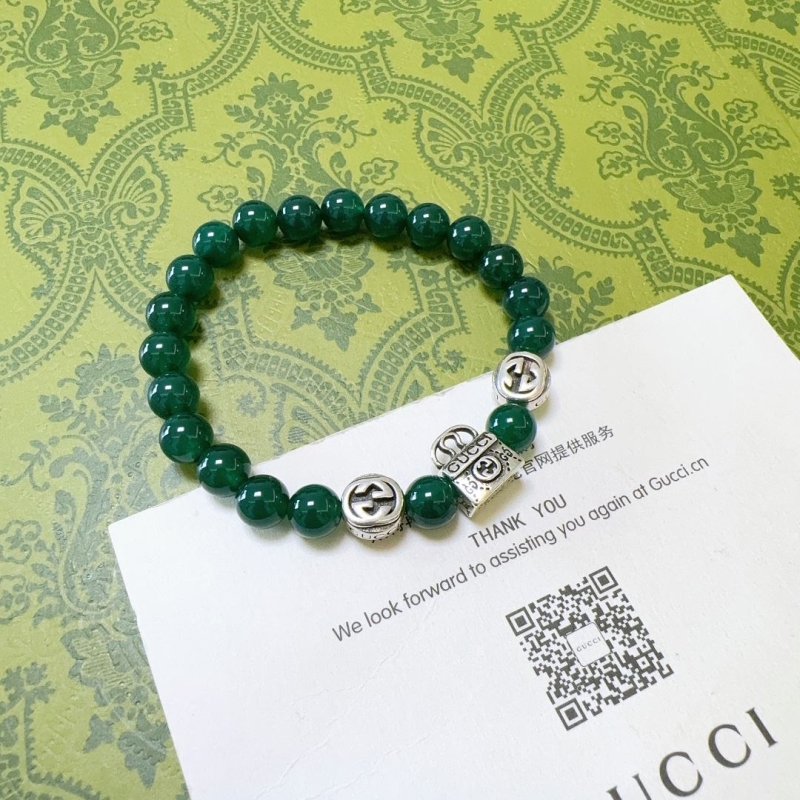 G*u*i bracelets